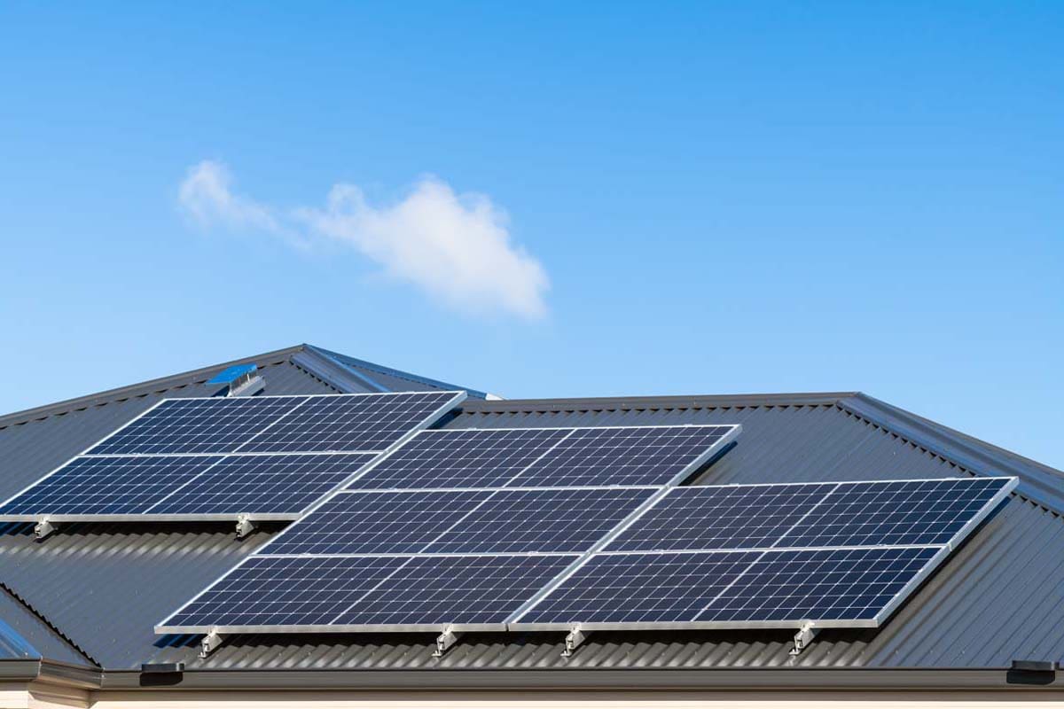 A solar panel system with blue sky by Hunter Valley